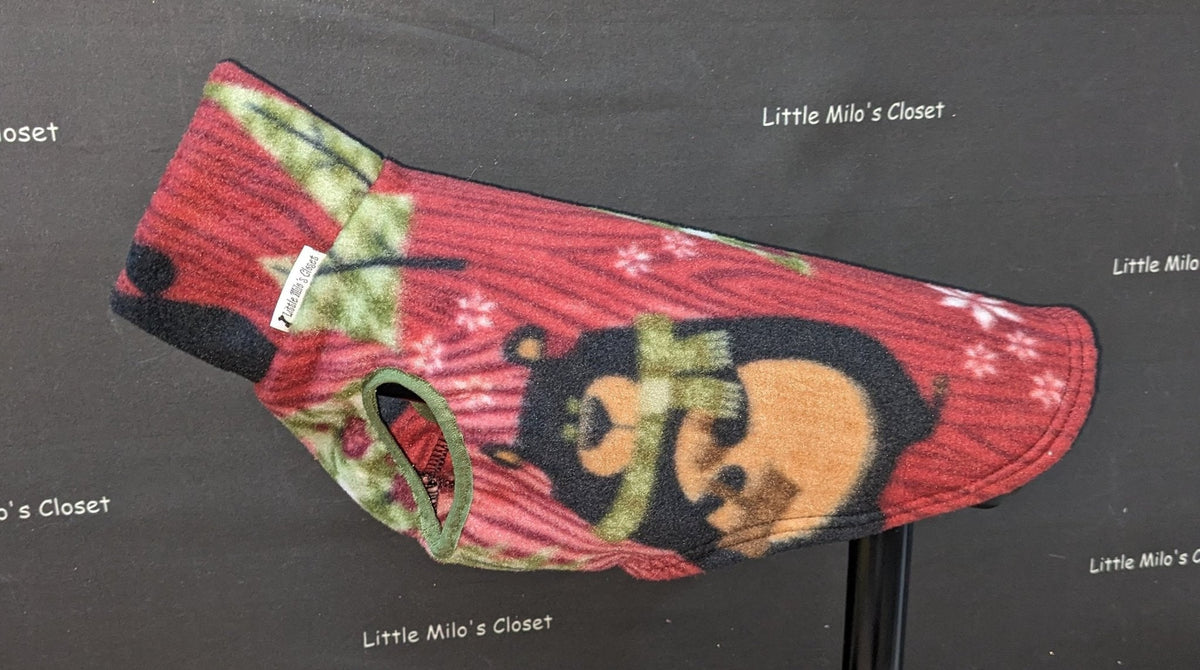 Red Northern Bears fleece vest with a black bear in a green scarf for Italian Greyhounds
