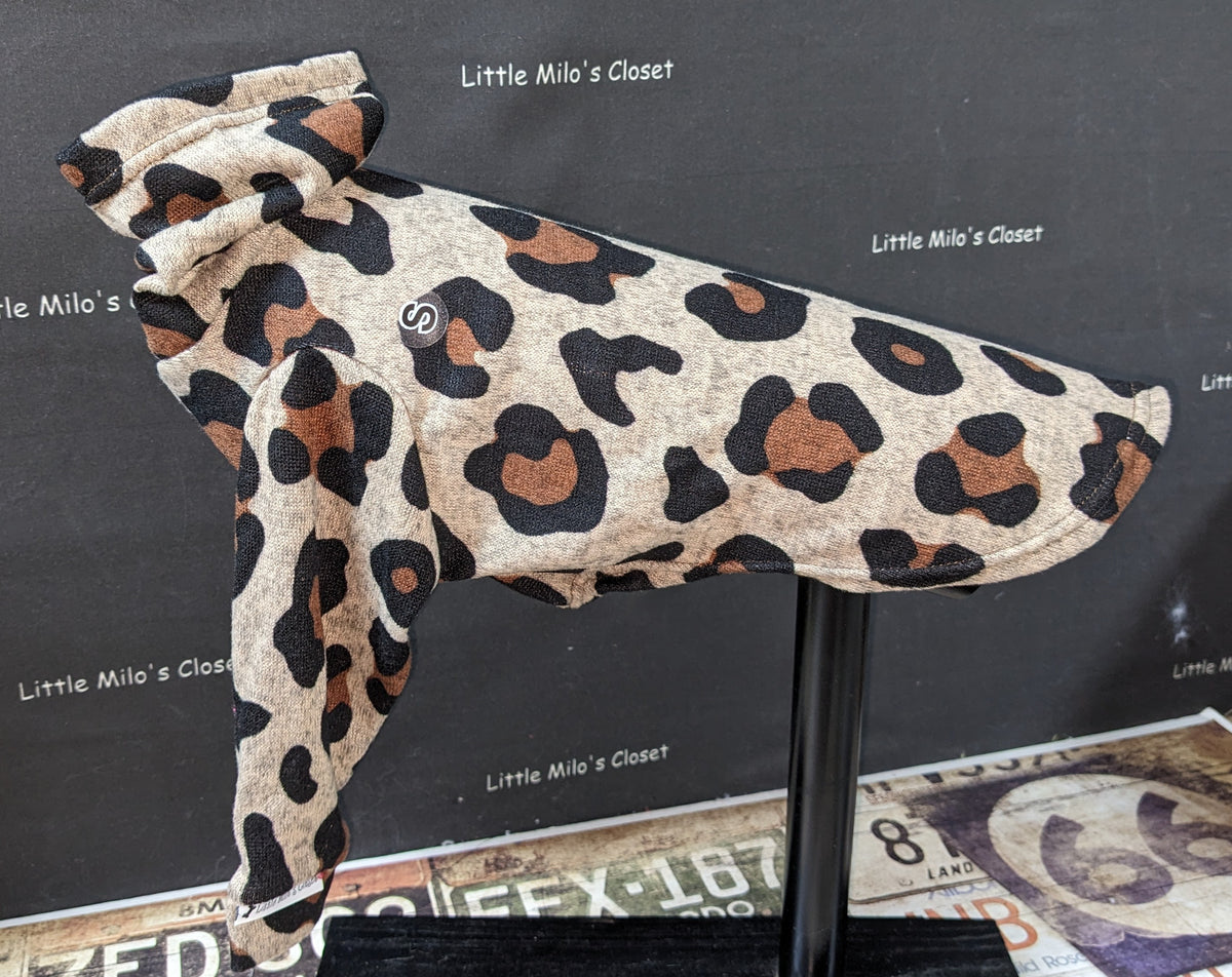 Large cheetah print hacci knit Italian Greyhound sweater in tan, brown and black, front angle on a dog form