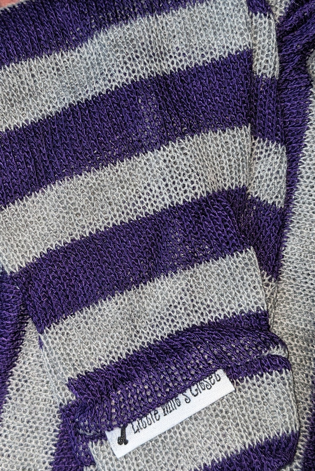 Purple and grey striped knit Italian Greyhound sweater, folded close-up