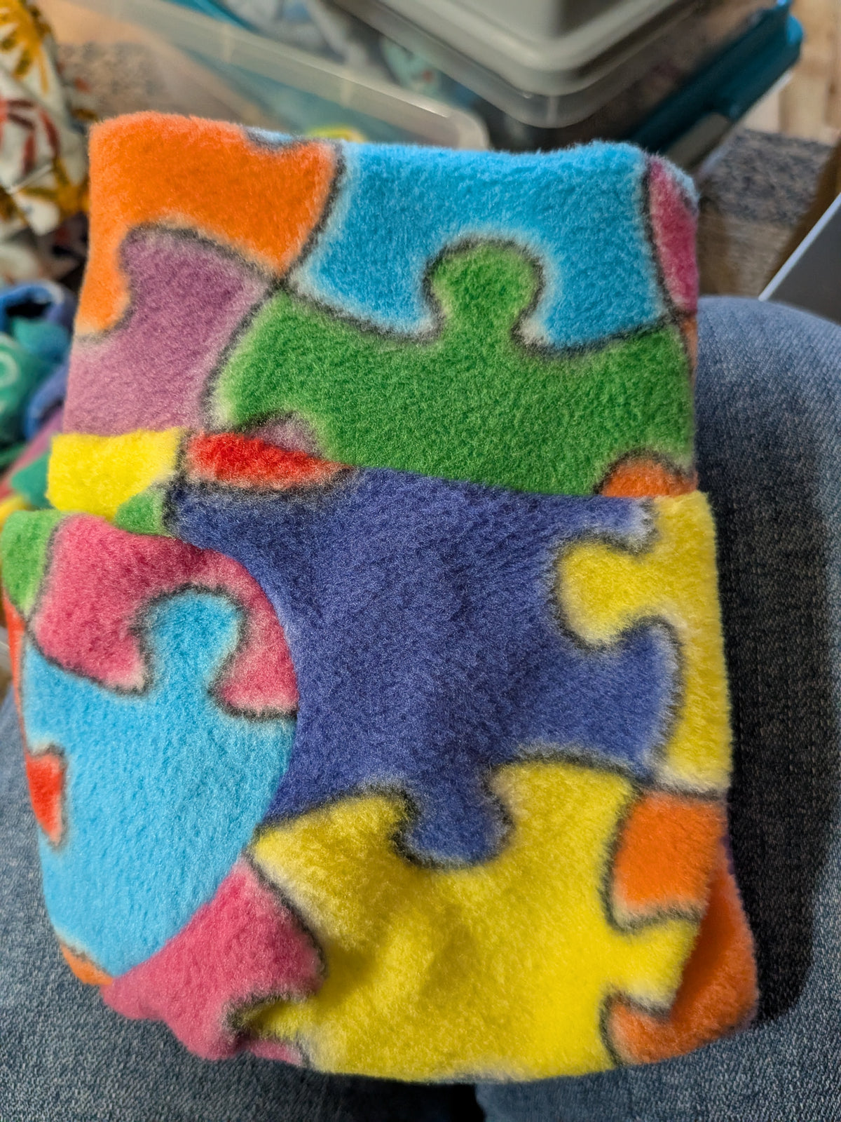 Folded puzzle piece fleece Italian Greyhound bodysuit in bright blue, yellow, green and pink