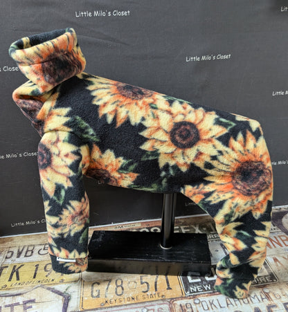 Sunflower fleece bodysuit for a medium Italian Greyhound, black with large yellow sunflowers, side view on a dog form