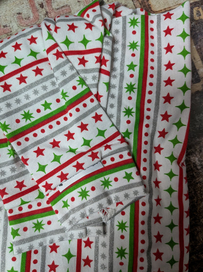 Folded white Christmas Ribbons two legged top with red, green and silver stripes and stars