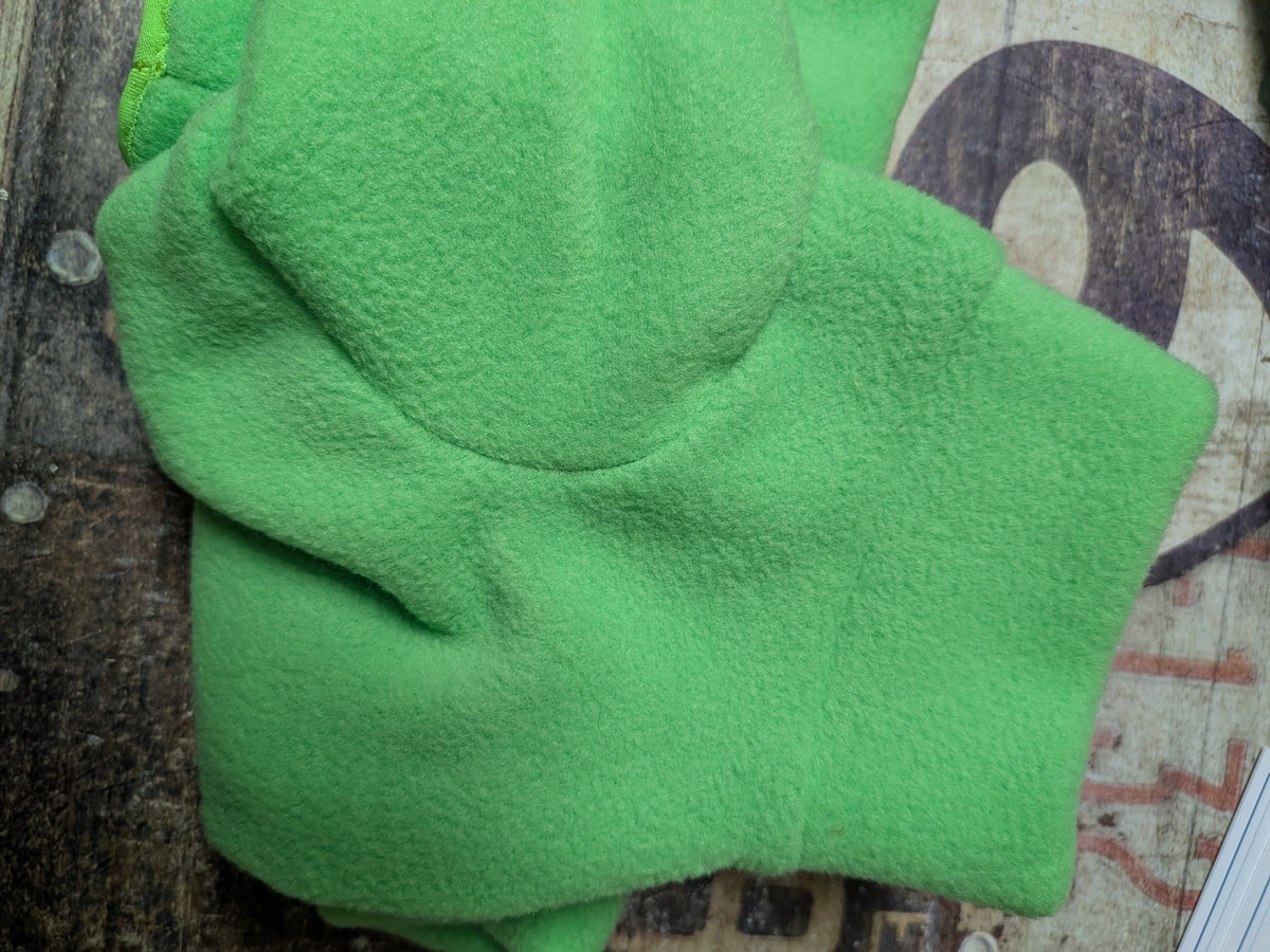 Folded solid bright green plush fleece bodysuit for an extra small Italian Greyhound