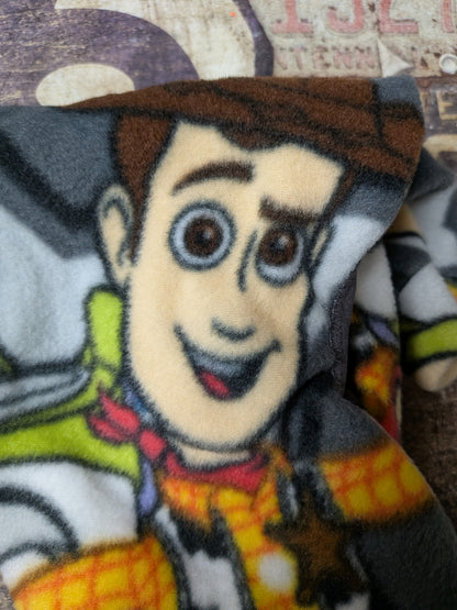 Close-up of a grey plush fleece Italian Greyhound bodysuit with a cartoon cowboy character print
