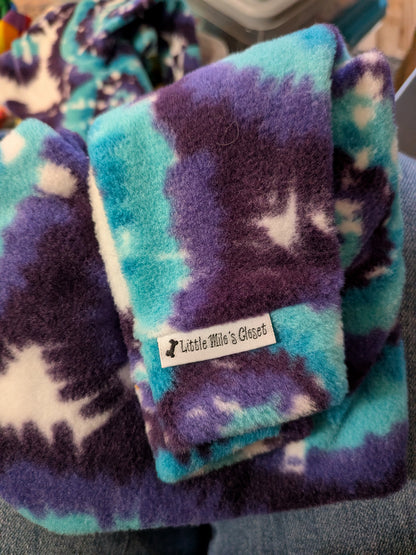 Folded purple and teal tie dye plush fleece Italian Greyhound bodysuit with brand label on the cuff
