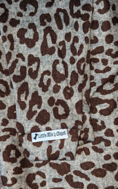 Small cheetah print hacci knit Italian Greyhound sweater in cream and brown, folded flat