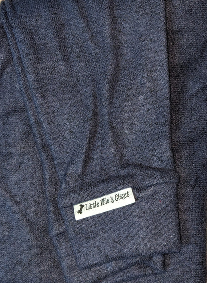 Navy hacci knit Italian Greyhound sweater folded flat with ribbed cuff and label
