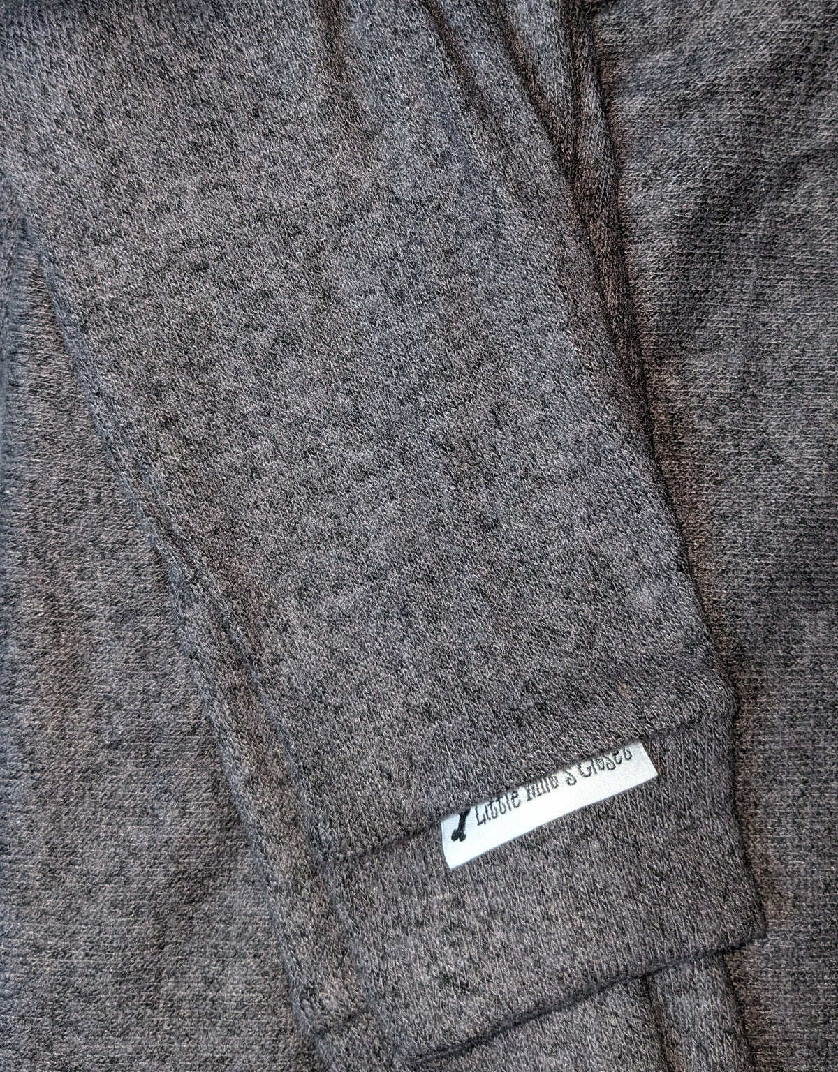 Grey hacci knit Italian Greyhound sweater folded flat, showing the soft brushed texture
