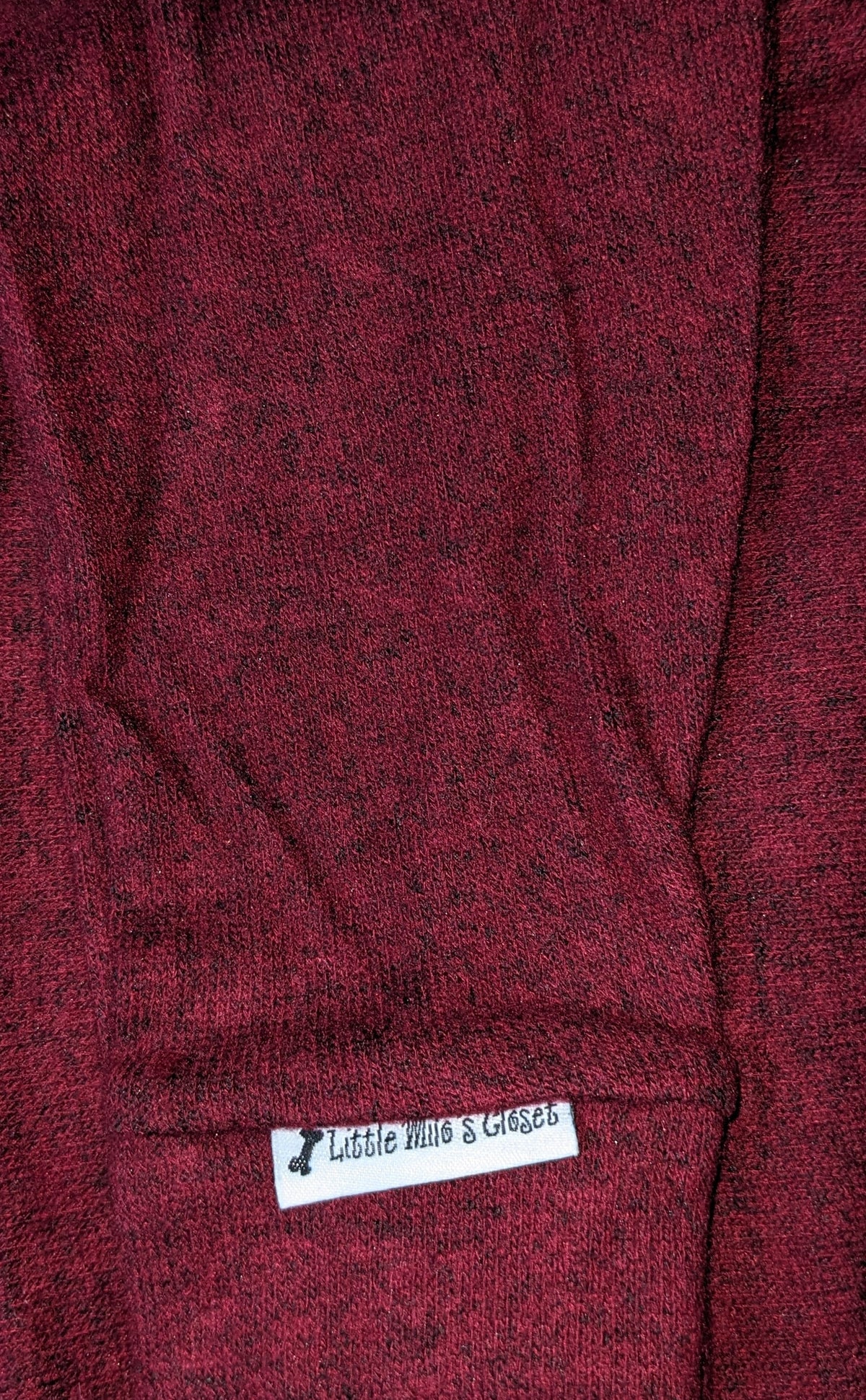 Burgundy hacci knit Italian Greyhound sweater folded flat with cuffed sleeve