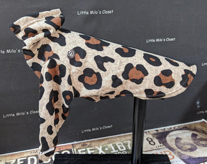 Large cheetah print hacci knit Italian Greyhound sweater in tan, brown and black, front angle on a dog form