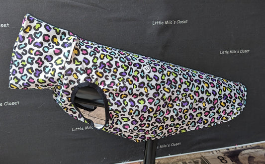 Multi Leopard medium UV sleeveless turtleneck Italian Greyhound vest with rainbow spots on a dog form