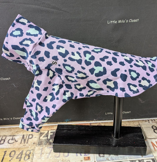 Lavender cotton lycra long sleeve top with purple and mint leopard spots, side view on a dog form