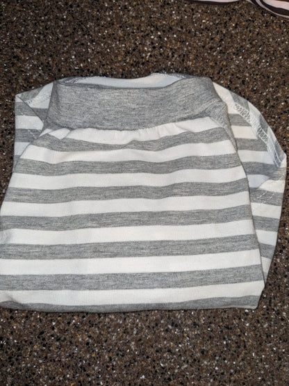 Grey and white striped upcycled shirt for a small Italian Greyhound with a grey neckband, folded flat lay