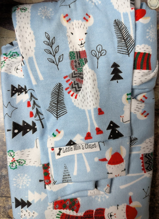 Llamas on Blue Christmas two legged top with llamas in scarves and pine trees, folded flat with brand tag