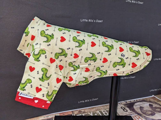 Dinosaur Hearts short sleeve cotton knit top with green dinosaurs and red hearts on a display form